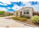 Front view of a charming house with well-maintained landscaping at 12105 W Luxton Ln, Avondale, AZ 85323