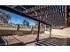 Covered patio overlooks a lush green space at 12234 S Shoshoni Dr, Phoenix, AZ 85044