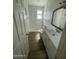 Updated bathroom with a walk-in shower and modern vanity at 1324 W Bethany Home Rd, Phoenix, AZ 85013