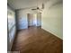 Spacious bedroom with hardwood floors and a walk-in closet at 1324 W Bethany Home Rd, Phoenix, AZ 85013