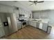 Modern kitchen with gray cabinets, stainless steel appliances and marble countertops at 1324 W Bethany Home Rd, Phoenix, AZ 85013