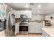 Modern kitchen with stainless steel appliances and a view to the living area at 1340 S 232Nd Ave, Buckeye, AZ 85326