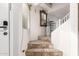 Tiled staircase with decorative wall mirror at 1340 S 232Nd Ave, Buckeye, AZ 85326