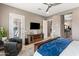 Relaxing main bedroom with ensuite bathroom access and sitting area at 1457 E Copper Holw, Queen Creek, AZ 85140