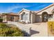 Attractive front entry with walkway and sitting area at 15430 W Amelia Dr, Goodyear, AZ 85395