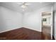 Small bedroom with hardwood floors and a window at 1723 E Cotton Ct, Gilbert, AZ 85234