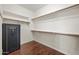 Walk-in closet with built-in shelving and a safe at 1723 E Cotton Ct, Gilbert, AZ 85234