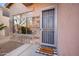 Inviting front entrance with a security door and welcome mat at 1723 E Cotton Ct, Gilbert, AZ 85234