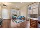 Bright living room with hardwood floors and large windows at 1723 E Cotton Ct, Gilbert, AZ 85234