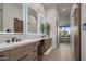 Modern bathroom with double vanity, large mirrors, and stylish finishes at 17444 N 79Th St, Scottsdale, AZ 85255