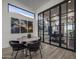 Small dining area with a round table and black chairs at 17444 N 79Th St, Scottsdale, AZ 85255