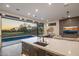 Modern kitchen with island and golf course view at 17444 N 79Th St, Scottsdale, AZ 85255