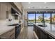 Modern kitchen boasts stainless steel appliances and island at 17444 N 79Th St, Scottsdale, AZ 85255