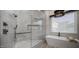 Spacious shower with glass walls and built-in bench at 17444 N 79Th St, Scottsdale, AZ 85255