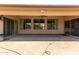 Covered patio with brick pavers and sliding glass doors at 17925 W Mauna Loa Ln, Surprise, AZ 85388