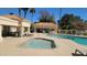 Relax in this luxurious community spa and pool with shaded seating areas at 1931 W Mulberry Dr, Chandler, AZ 85286