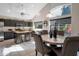 Kitchen with island, breakfast nook, and view into living room at 1931 W Mulberry Dr, Chandler, AZ 85286