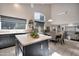 Kitchen with island, breakfast nook, and view of the backyard at 1931 W Mulberry Dr, Chandler, AZ 85286