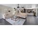 Living room with sectional sofa, coffee table, and dark hardwood floors at 1931 W Mulberry Dr, Chandler, AZ 85286