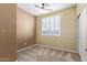 Spacious bedroom with window and closet at 2331 W Kristina Ave, San Tan Valley, AZ 85144