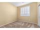 Bright bedroom with window and closet at 2331 W Kristina Ave, San Tan Valley, AZ 85144