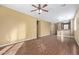 Living room with wood floors and access to kitchen and backyard at 2331 W Kristina Ave, San Tan Valley, AZ 85144