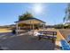 Community park with shaded seating and picnic tables at 2331 W Kristina Ave, San Tan Valley, AZ 85144