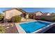 Refreshing backyard pool, perfect for summer enjoyment at 2331 W Kristina Ave, San Tan Valley, AZ 85144