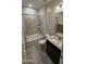 Bathroom with bathtub, shower, and granite vanity at 24550 W Mohave St, Buckeye, AZ 85326