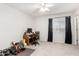 Bedroom with home office setup and window at 2551 E Saratoga St, Gilbert, AZ 85296