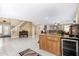 Kitchen with island and wine cooler, open to entryway at 2551 E Saratoga St, Gilbert, AZ 85296