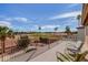 Balcony view overlooking a well-manicured golf course with lounge chairs under a clear sky at 2551 E Saratoga St, Gilbert, AZ 85296