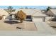 Single story home with a large front yard at 2605 N 133Rd Ave, Goodyear, AZ 85395