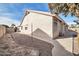 Side yard with gravel and a walkway at 2605 N 133Rd Ave, Goodyear, AZ 85395