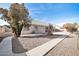 Landscaped backyard with gravel and walkways at 2605 N 133Rd Ave, Goodyear, AZ 85395