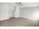 Bright bedroom featuring wood-look floors and an open layout at 2605 N 133Rd Ave, Goodyear, AZ 85395