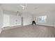 Spacious living room featuring hardwood floors and natural light at 2605 N 133Rd Ave, Goodyear, AZ 85395