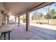 Covered patio with string lights and table at 2605 N 133Rd Ave, Goodyear, AZ 85395