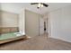 Bedroom features a sliding closet door and neutral carpet at 2626 S Southwind Dr, Gilbert, AZ 85295