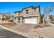 Beautiful two-story home featuring a spacious driveway and attached two-car garage at 2626 S Southwind Dr, Gilbert, AZ 85295