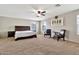 Spacious main bedroom with ceiling fan and large windows at 2626 S Southwind Dr, Gilbert, AZ 85295