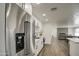 Modern kitchen with stainless steel appliances and white cabinetry at 3530 W Marlette Ave, Phoenix, AZ 85019