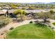 Aerial view of houses and golf course at 41604 N Cedar Chase Rd, Anthem, AZ 85086