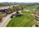 Aerial view of a house near a golf course at 41604 N Cedar Chase Rd, Anthem, AZ 85086