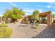 Landscaped backyard with patio and desert landscaping at 41604 N Cedar Chase Rd, Anthem, AZ 85086