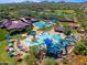 Aerial view of community pool, water park, and clubhouse at 41604 N Cedar Chase Rd, Anthem, AZ 85086