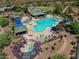 Community pool and spa area with lounge chairs at 41604 N Cedar Chase Rd, Anthem, AZ 85086