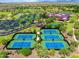 Aerial view of tennis courts and a community center at 41604 N Cedar Chase Rd, Anthem, AZ 85086