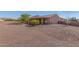 Gravel backyard with view of house and mountains at 44429 N 1St Dr, New River, AZ 85087