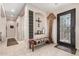 Bright entryway with tile floors, decorative accents, and a bench at 44429 N 1St Dr, New River, AZ 85087